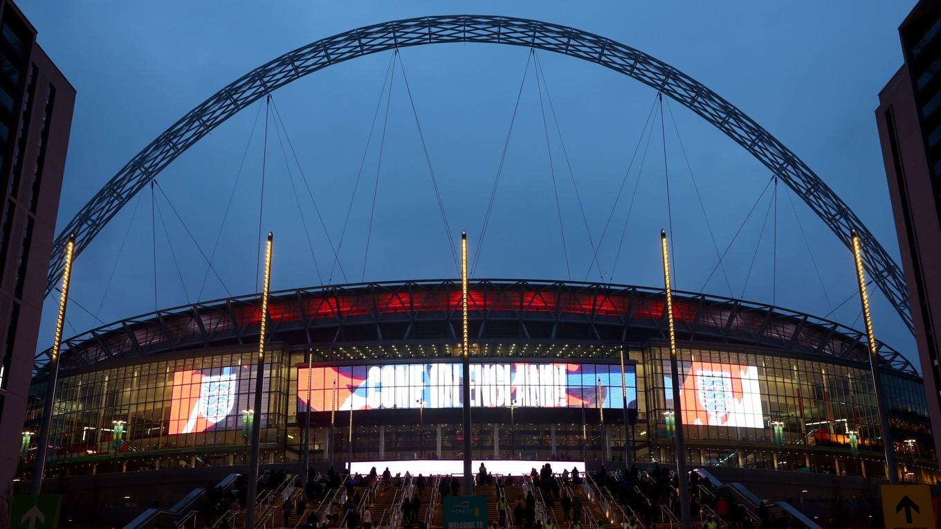 Wembley Stadium med sin karakteristiska båge över arenan är platsen för Champions League-finalen mellan Dortmund och Real Madrid i helgen. Epoch Times porträtterar i dag världens mest mytomspunna arena. Foto: Clive Rose/Getty Images