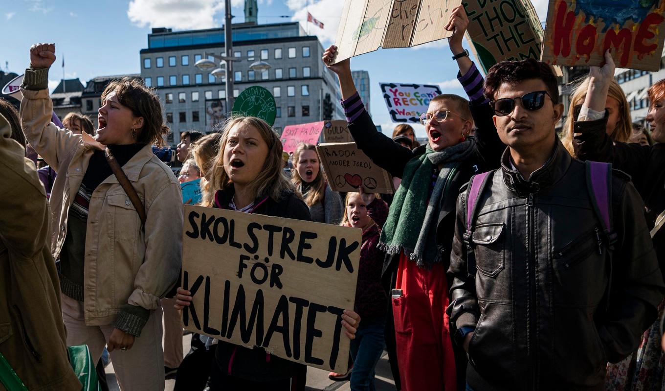 Den svenska klimataktivisten Greta Thunberg protesterar tillsammans med andra demonstranter i Stockholm den 9 september 2022. Foto: Jonathan Näckstrand/AFP via Getty Images