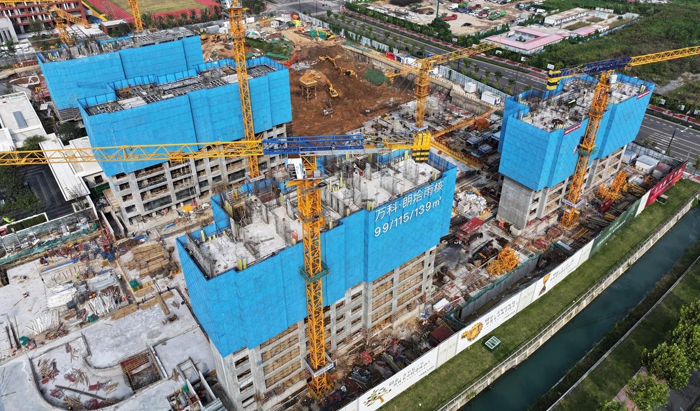 Flygfoto från den 9 oktober visar bostadshus under uppförande av den kinesiska fastighetsutvecklaren Vanke i Nanjing, i Kinas östra Jiangsuprovinsen. Foto: STR/AFP via Getty Images