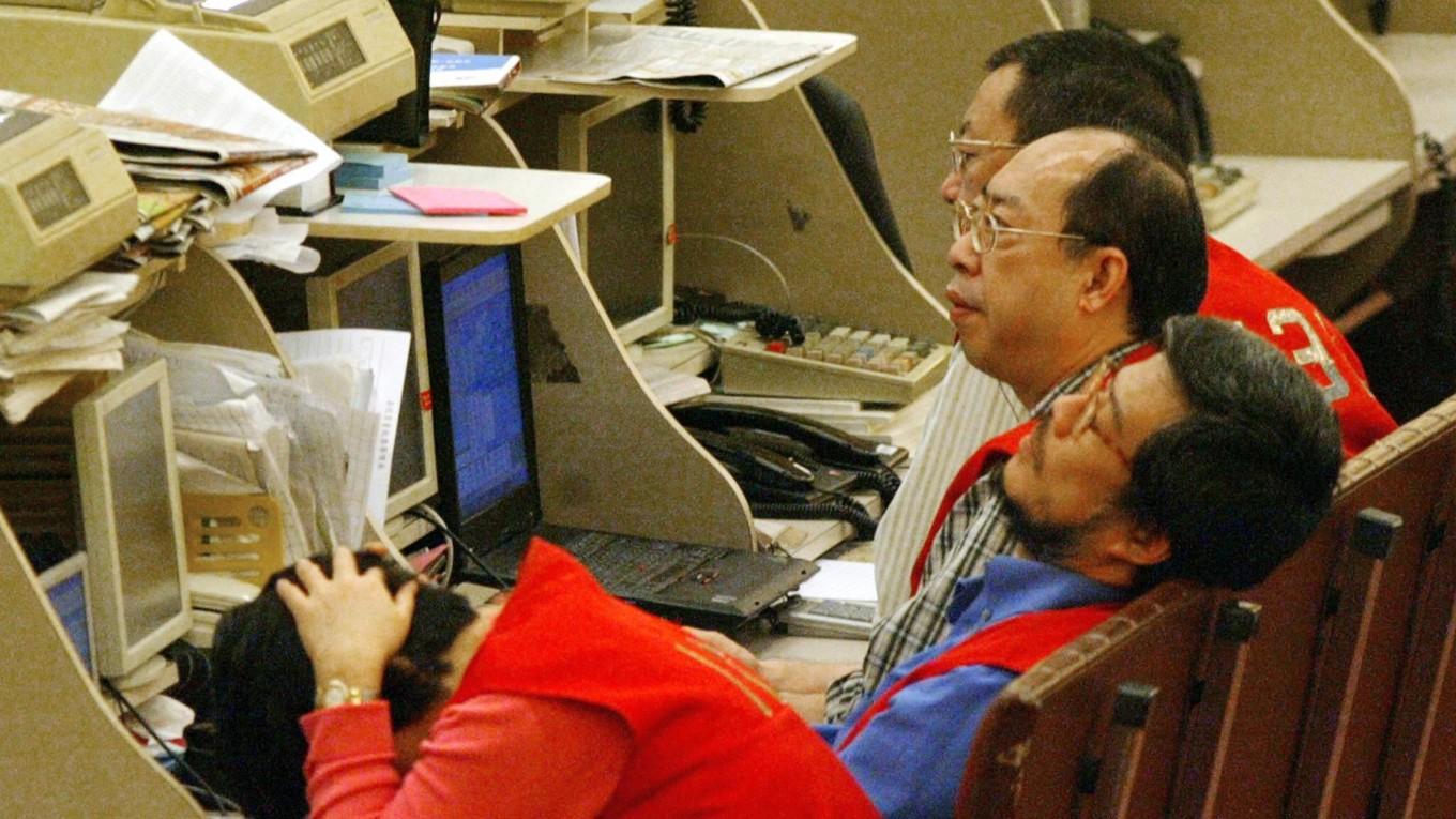 Handeln på Asiens ledande börser var under de inledande timmarna på måndagen ganska odramatisk. Foto: Ted Aljibe/AFP via Getty Images