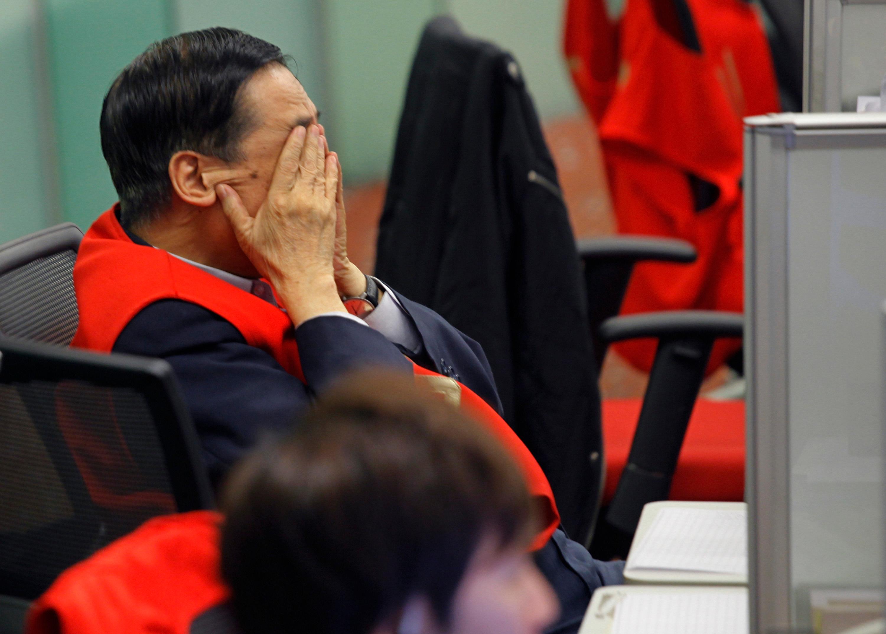 Tråkig stämning på Hongkongbörsen. Arkivbild. Foto: Vincent Yu/AP/TT