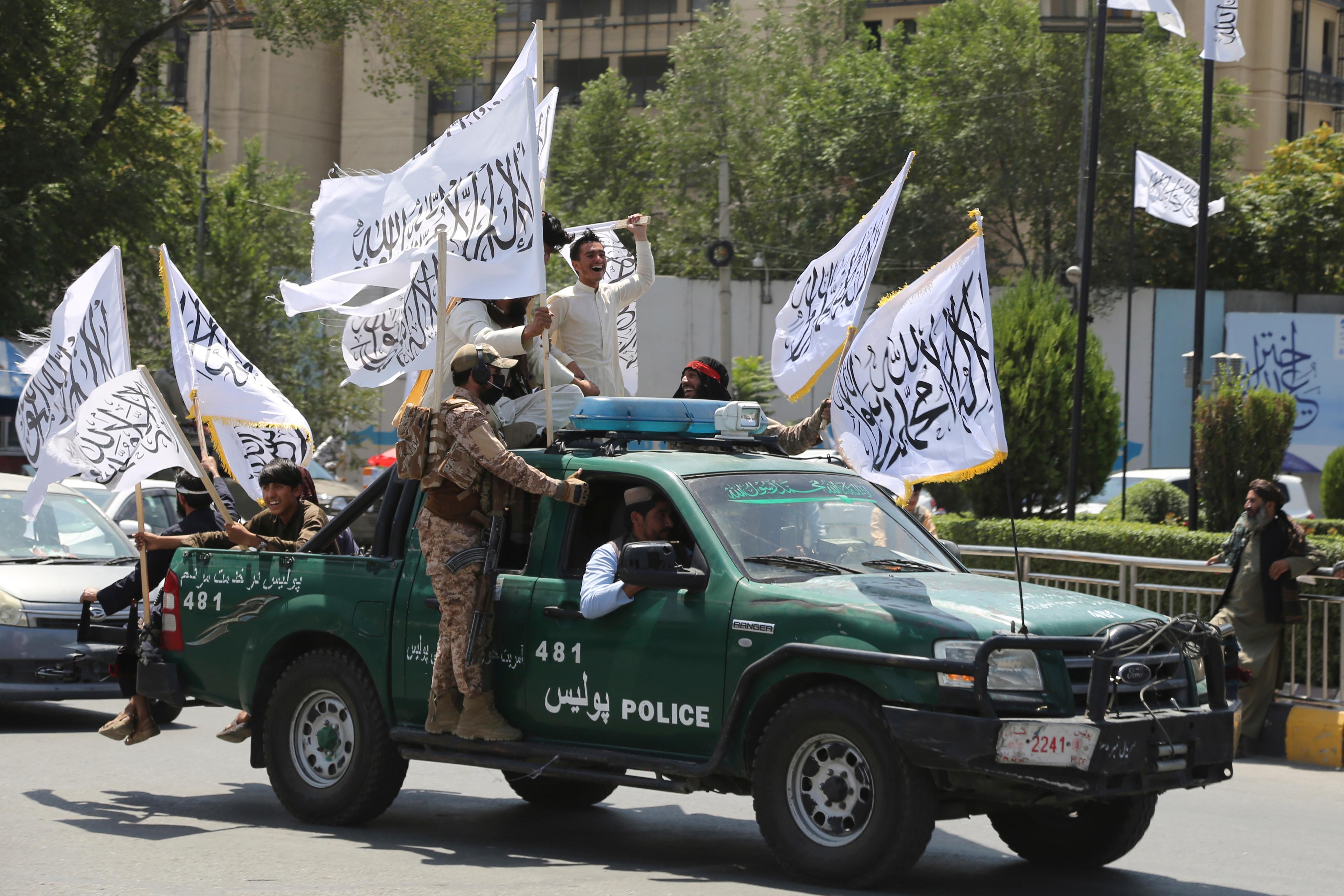 Talibaner firar treårsdagen sedan sitt maktövertagande i Afghanistans huvudstad Kabul den 14 augusti. Foto: Siddiqullah Alizai/AP/TT