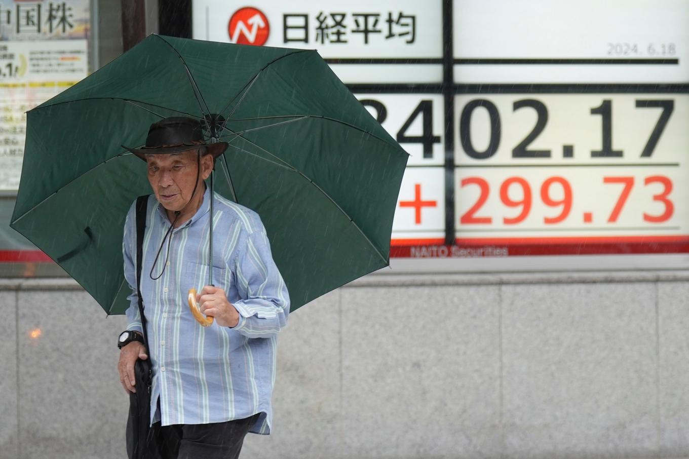 Det var blandade tongångar på Asienbörserna på fredagsförmiddagen. Arkivbild. Foto: Eugene Hoshiko/AP/TT