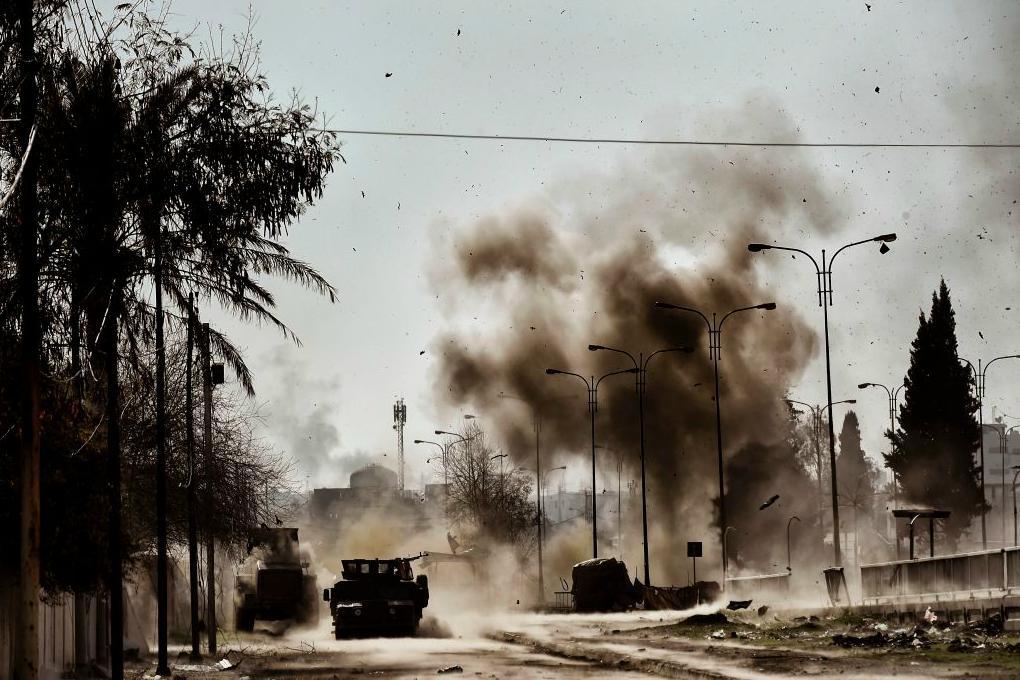 

En bild från dagens strider, 5 mars, i Mosul. Foto: Aris Messinis /AFP/Getty Images                                                                                        
