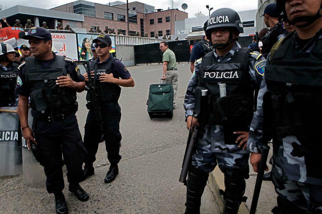 














Poliser i Honduras. Arkivbild. Foto: Rodrigo Abd/AP/TT                                                                                                                                                                                                                                                                                                                                                                                                                                                                                                                                                                                                                                                                                    