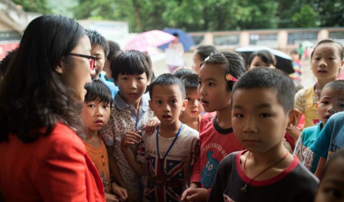 

Barn i byn Xianghe i södra Kina, 19 juni 2015. Foto: Johannes Eisele/AFP/Getty Images                                                                                        