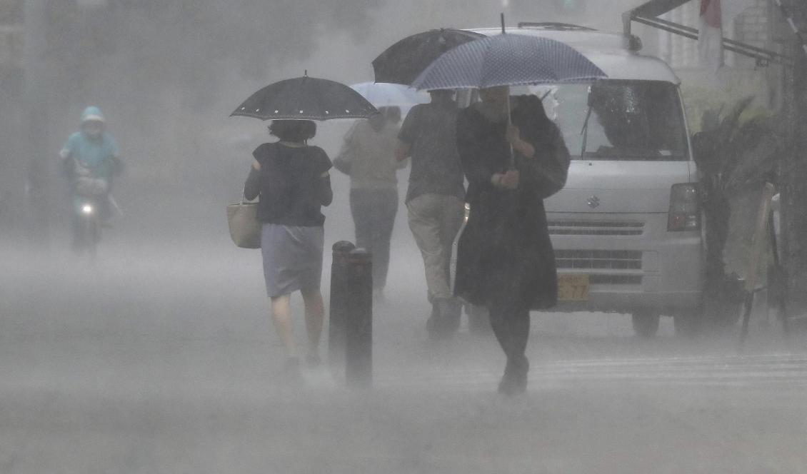 Japan har de senaste dagarna drabbats av kraftiga skyfall. Foto: Daisuke Urakami/AP/TT
