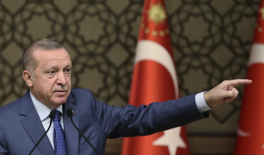 Turkiets president Recep Tayyip Erdogan säger att Turkiet kan behöva gå in och avlägsna kurdiska styrkor och kräver europeiskt stöd för sina planer. Foto: Presstjänsten vid Turkiets presidentkansli via AP/TT