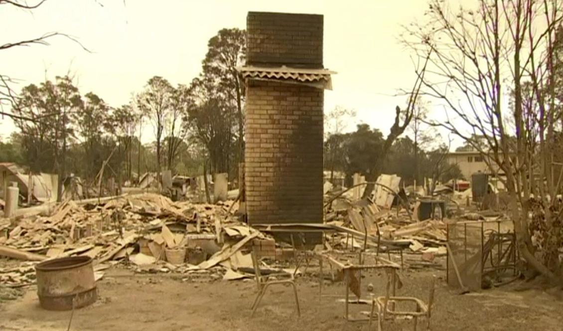 Ett nedbränt hus i Mallacoota i nordöstra Victoria. Foto: ABC/AP/TT