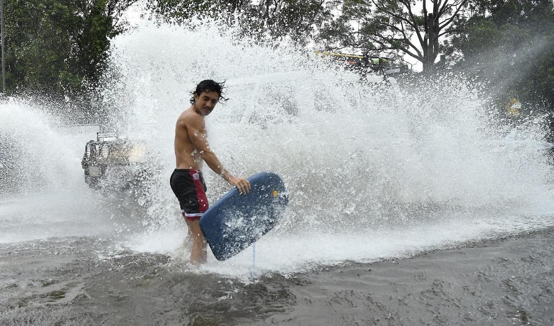 I flera dagar har skyfall orsakat översvämningar i delstaterna New South Wales och Queensland. Foto: Joel Carrett/AP-TT
