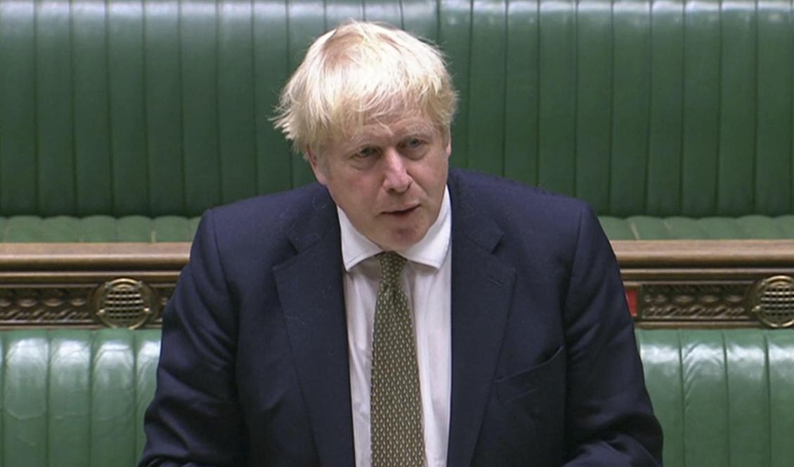 Storbritanniens premiärminister Boris Johnson meddelar underhuset vad den nya virusplanen innebär. Foto: AP/TT