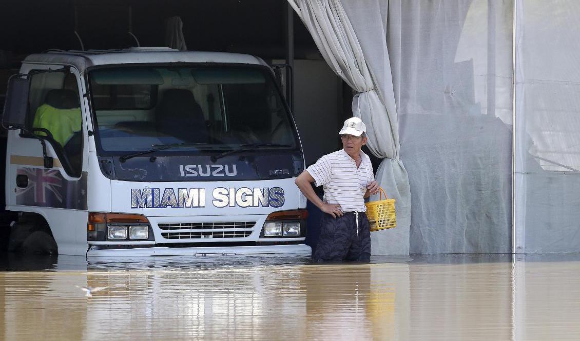 Översvämningar i Logan, söder om Brisbane. Foto: Jono Searle/AAP/AP/TT