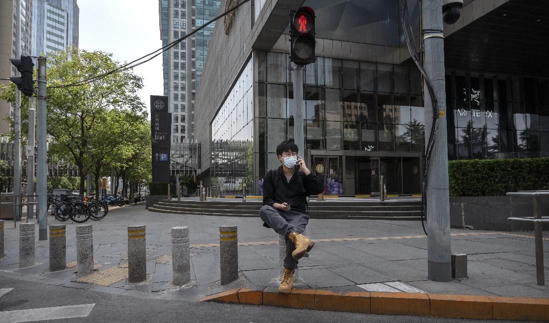 I vissa provinser kan man inte ta emot samtal och sms från utlandet utan särskild registrering sedan mobiloperatörerna börjat stänga av tjänsterna. Foto: Kevin Frayer/Getty Images