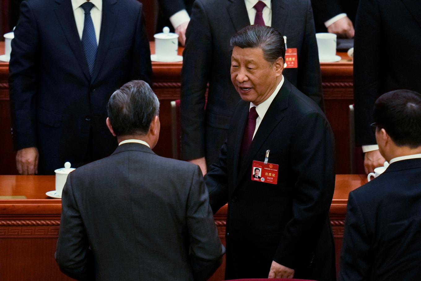Politiskt toppmöte i Kina i veckan. Landets president Xi Jinping står inför flera utmaningar. Foto: Ng Han Guan/AP/TT
