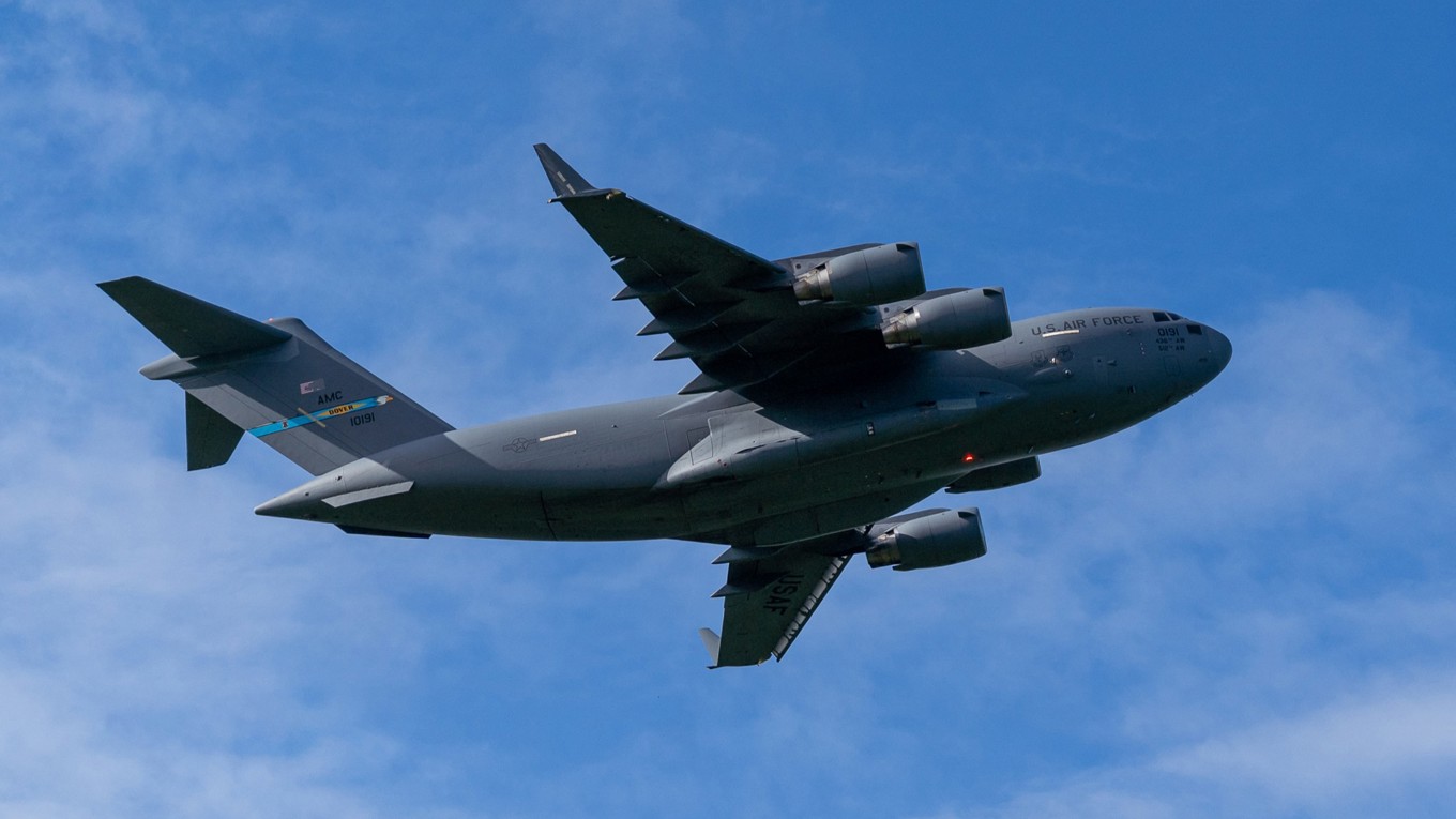 En C-17 A Globemaster III i luften i Puerto Rico den 11 december 2025. Foto: Jaydee Lee Serrano/AFP via Getty Images