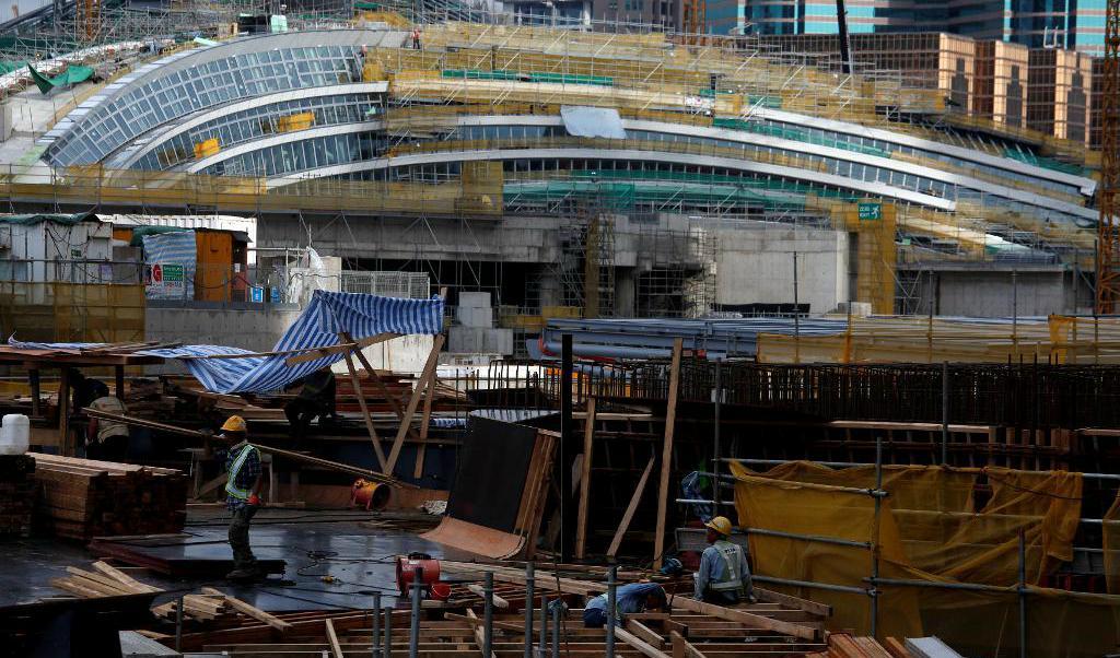 

Järnvägsstationen West Kowloon i Hongkong håller på att byggas. Det är på delar av den som kinesiska gränskontrollanter och polis kommer att arbeta under kinesisk lag, enligt ett förslag som väckt kritik. FotoL Bobby Yip/Reuters/TT                                                                                        